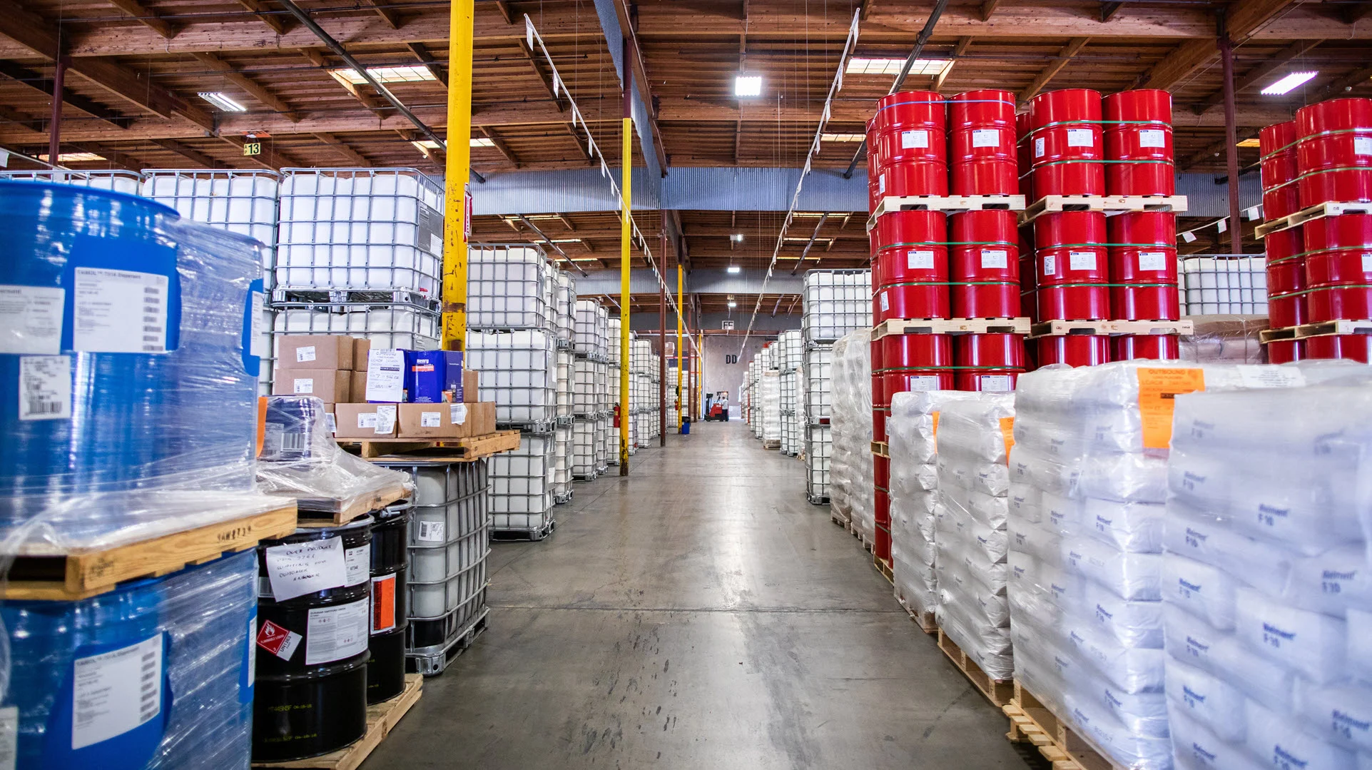 Aleemsons chemical distribution warehouse — drums, IBC totes and pallets